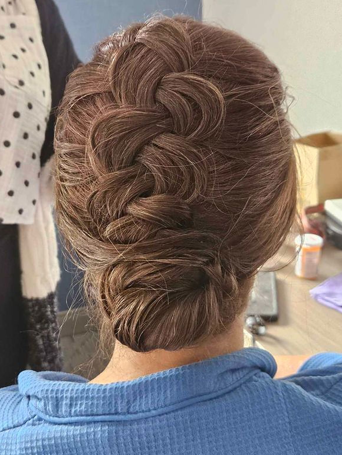 Braided updo with a low, textured bun